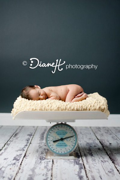 Newborn Baby Pose on vintage baby scale